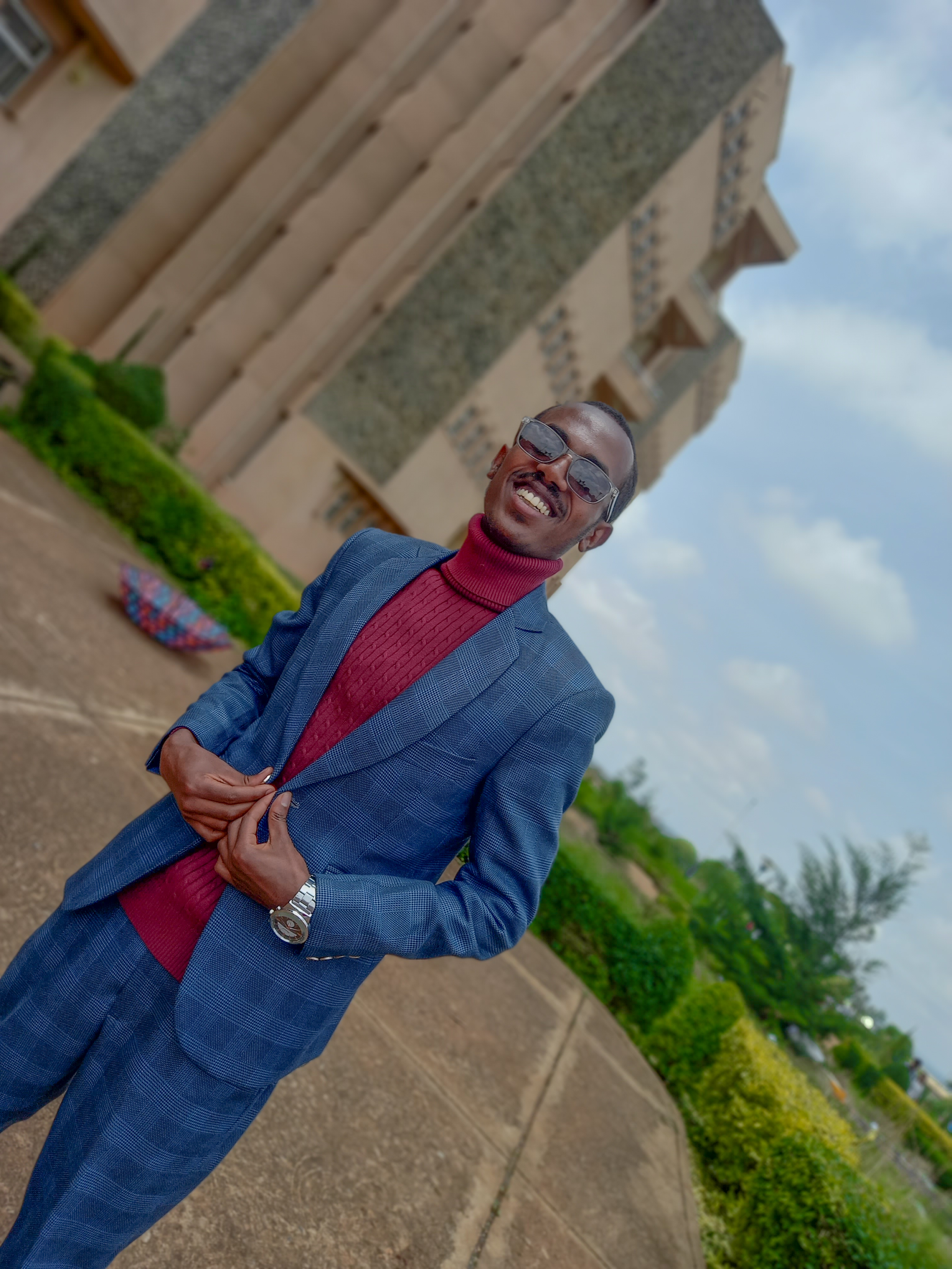 A professional headshot of Zemelak Fiseha